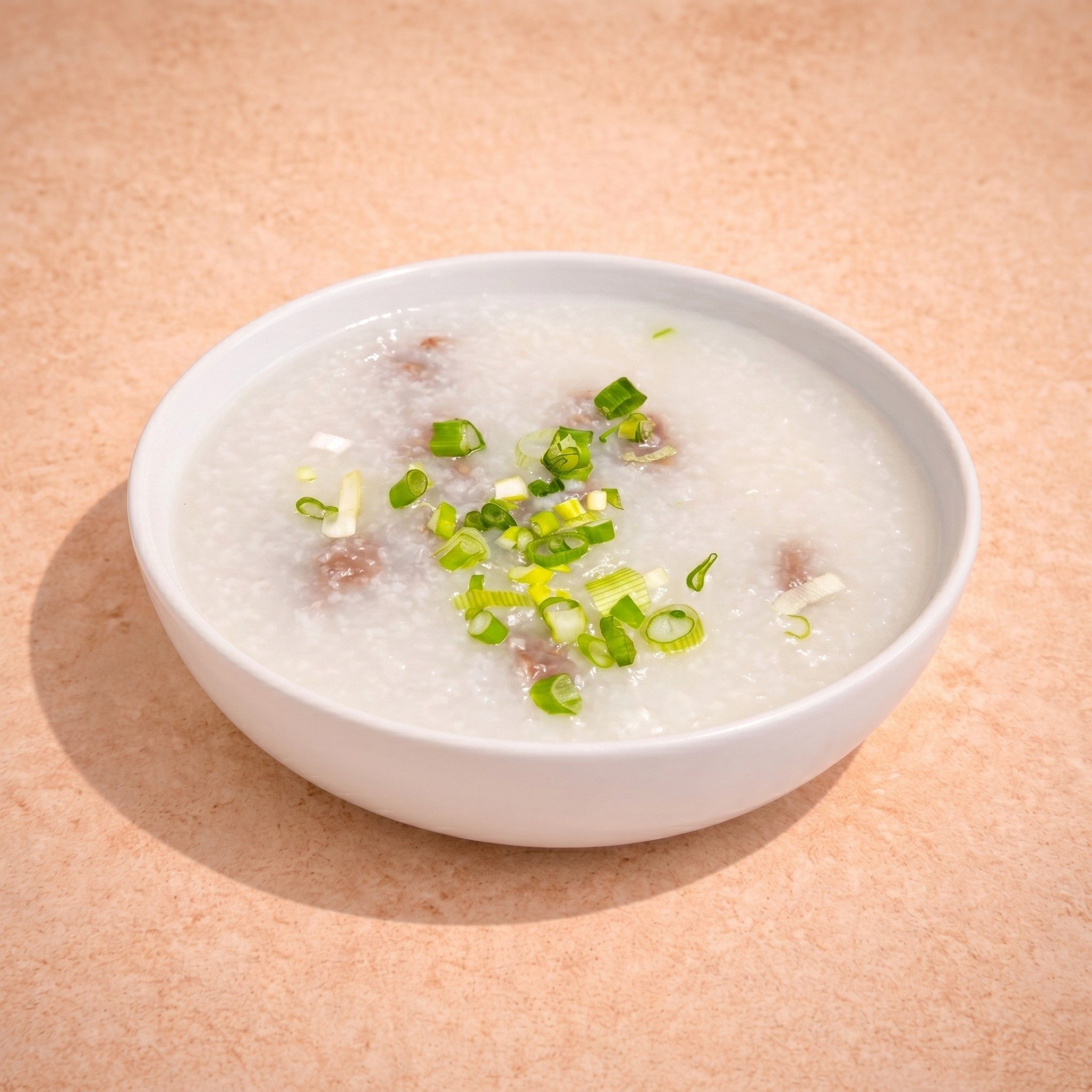 Minced Beef Congee (生滚牛肉粥).